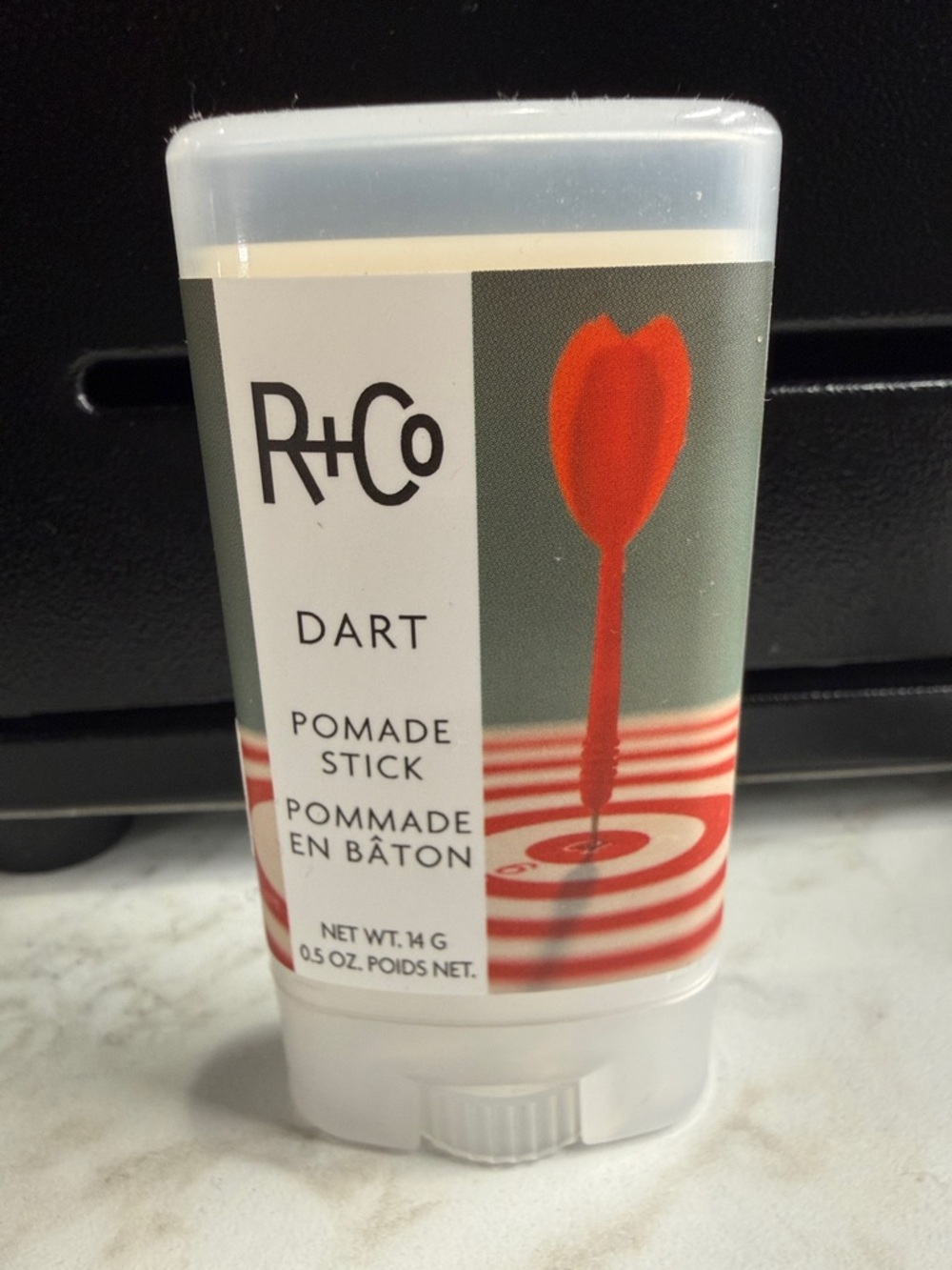 R+Co Dart Pomade Stick 
Travel size 0.5 oz
